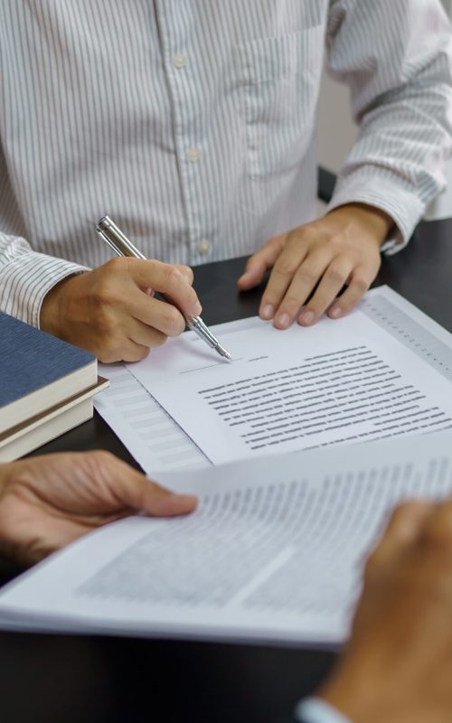 legal-counsel-presents-client-signed-contract-with-gavel-legal-law-justice-lawyer-concept-min