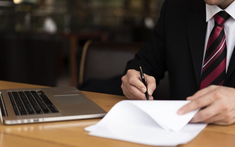 man-office-writing-paper-min